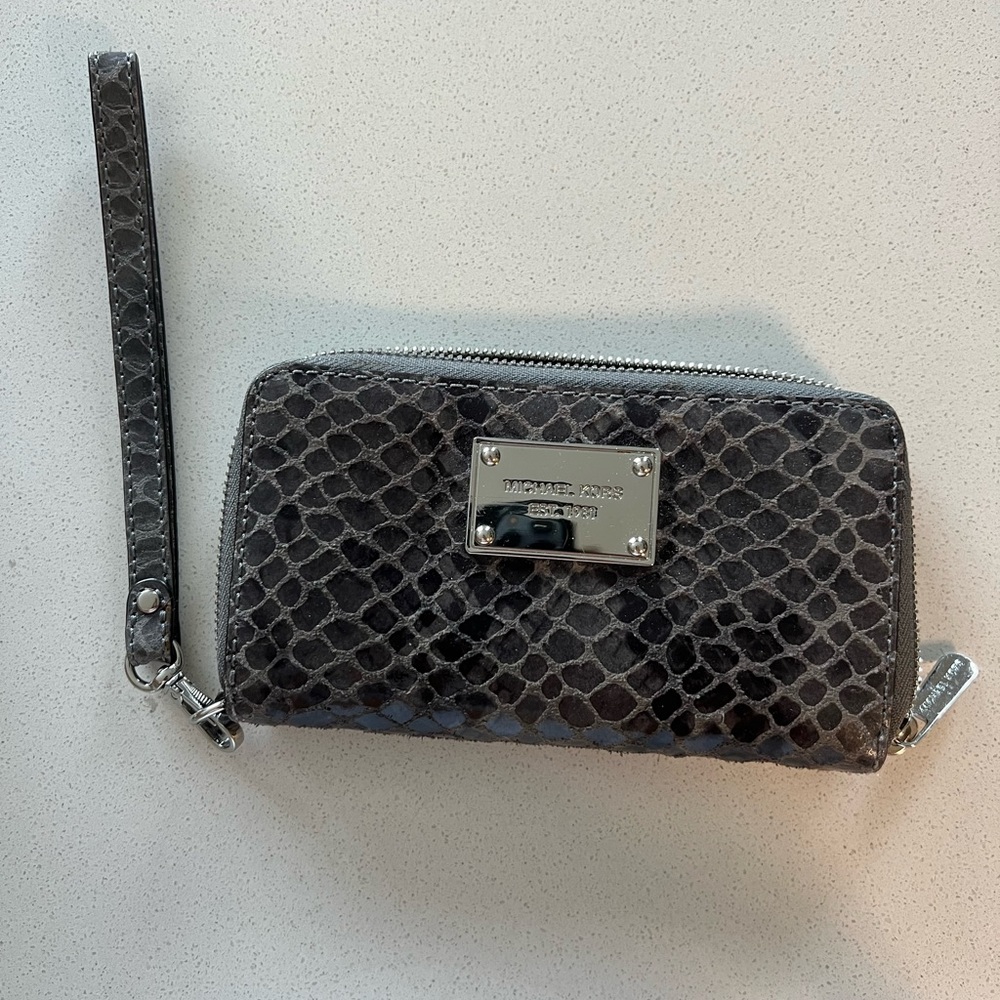 Gently used Michael Kors wallet with wrist strap